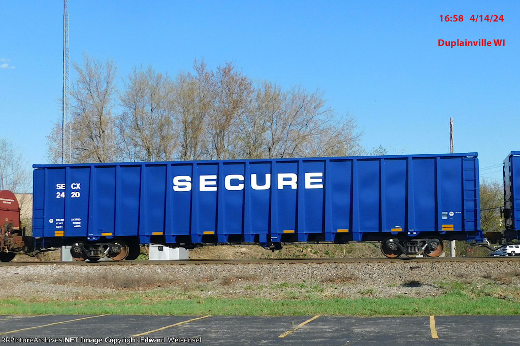 17 new GE lease gondolas roll north on CN - wonder what SECURE is